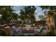 Inviting patio with fire pit, comfortable seating, and lush landscaping at 2606 Marchmont St # 102, Raleigh, NC 27608