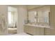 Spa-like bathroom with double vanity and marble at 2606 Marchmont St # 102, Raleigh, NC 27608