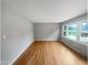 Bright living room featuring hardwood floors and large windows at 1526 Clermont Rd, Durham, NC 27713