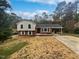 Charming ranch home with a brick facade and attached carport at 1526 Clermont Rd, Durham, NC 27713