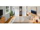 Main bedroom with hardwood floors, large windows, and walk-in closet at 1526 Clermont Rd, Durham, NC 27713