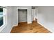 Bedroom with hardwood floors, closet, and window at 1526 Clermont Rd, Durham, NC 27713