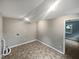 Laundry area with vinyl flooring and access to other rooms at 1526 Clermont Rd, Durham, NC 27713