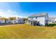 Spacious backyard with large grassy area and screened porch at 52 E Piston Pt, Clayton, NC 27520
