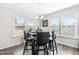 Bright breakfast nook with wood floor and window seating at 52 E Piston Pt, Clayton, NC 27520