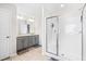 Bathroom with gray vanity, large shower, and tile flooring at 52 E Piston Pt, Clayton, NC 27520