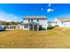 Two-story house with backyard, screened porch, and patio at 52 E Piston Pt, Clayton, NC 27520
