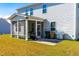 Home exterior showcasing a screened porch and grill at 52 E Piston Pt, Clayton, NC 27520