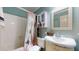 Small bathroom with shower/tub combo and vanity at 3158 Morningside Dr, Raleigh, NC 27607