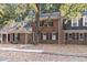 Brick townhouse exterior with fall foliage at 3158 Morningside Dr, Raleigh, NC 27607
