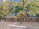 Brick townhouses nestled amongst autumn leaves at 3158 Morningside Dr, Raleigh, NC 27607