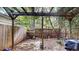 Small backyard with wooden pergola and gate at 3158 Morningside Dr, Raleigh, NC 27607