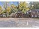 Brick townhouses with parking and autumn leaves at 3158 Morningside Dr, Raleigh, NC 27607