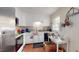 Small kitchen with white cabinets and stainless steel appliances at 3158 Morningside Dr, Raleigh, NC 27607