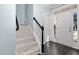 Entryway with stairs and hardwood floors at 2106 White Pond Ct, Apex, NC 27523