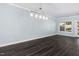 Bright dining room with hardwood floors and large window at 2106 White Pond Ct, Apex, NC 27523