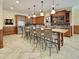 Long bar with seating in a finished basement at 1628 Morning Mountain Rd, Raleigh, NC 27614