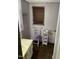 Bathroom with single vanity, toilet, and wood-look floors at 206 W Garner Rd, Garner, NC 27529