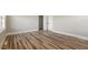 Spacious bedroom featuring hardwood floors and ample natural light at 203 W Stewart St, Coats, NC 27521
