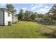 Spacious backyard with grassy area and room for outdoor activities at 203 W Stewart St, Coats, NC 27521