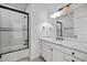 Bathroom with granite countertop, bathtub, and shower at 110 Bywater Way, Chapel Hill, NC 27516