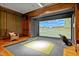 Golf simulator with a large screen and putting green at 110 Bywater Way, Chapel Hill, NC 27516