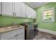 Laundry room with washer, dryer, and sink at 110 Bywater Way, Chapel Hill, NC 27516