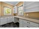 Laundry room with built in cabinets and counter space at 110 Bywater Way, Chapel Hill, NC 27516