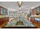 Large kitchen island with sink and breakfast bar at 110 Bywater Way, Chapel Hill, NC 27516