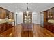 Gourmet kitchen with a large island and high-end appliances at 110 Bywater Way, Chapel Hill, NC 27516