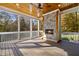 Screened porch with stone fireplace and wood ceiling at 110 Bywater Way, Chapel Hill, NC 27516