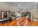 Home gym with various equipment and hardwood floors at 110 Bywater Way, Chapel Hill, NC 27516