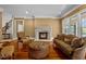 Relaxing sitting room featuring a fireplace and comfortable seating at 110 Bywater Way, Chapel Hill, NC 27516