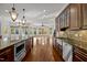 Open concept kitchen with island and breakfast area at 110 Bywater Way, Chapel Hill, NC 27516
