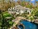 Aerial view of home, pool, and landscaped grounds at 110 Bywater Way, Chapel Hill, NC 27516