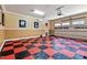 Spacious garage with checkered floor and ample storage at 110 Bywater Way, Chapel Hill, NC 27516