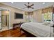 Bright bedroom with ensuite bathroom and large windows at 110 Bywater Way, Chapel Hill, NC 27516