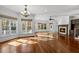 Bright living room with hardwood floors, fireplace, and abundant natural light at 110 Bywater Way, Chapel Hill, NC 27516