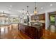 Open kitchen boasting a large island and ample cabinet space at 110 Bywater Way, Chapel Hill, NC 27516
