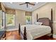 Spacious bedroom with wood floors and large windows at 110 Bywater Way, Chapel Hill, NC 27516