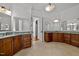 Elegant bathroom with double vanity, granite countertops, and ample storage at 110 Bywater Way, Chapel Hill, NC 27516