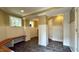 Finished basement with built-in bench and tile flooring at 110 Bywater Way, Chapel Hill, NC 27516