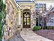 Inviting entryway with stone accents and a double wooden door at 110 Bywater Way, Chapel Hill, NC 27516