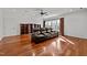 Home theater with three recliner chairs and wood floors at 110 Bywater Way, Chapel Hill, NC 27516
