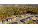 Aerial view of neighborhood homes and surrounding woods at 3500 Malamar Way, Fuquay Varina, NC 27526