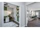 Home office with built-in shelving and kitchen view at 561 Fosterton Cottage Way, Raleigh, NC 27603
