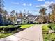 Elegant home with stone and shingle accents, long driveway at 110 Bywater Way, Chapel Hill, NC 27516