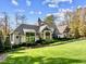 Stunning home with expansive lawn and wooded backdrop at 110 Bywater Way, Chapel Hill, NC 27516