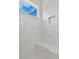 Bright walk-in shower with subway tile and built-in seat at 156 Annie Bell Ln, Roxboro, NC 27574