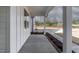 Side view of the covered front porch showcasing the home's exterior at 156 Annie Bell Ln, Roxboro, NC 27574